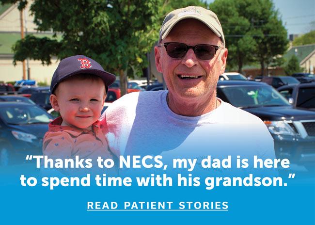 Patient holding his grandson